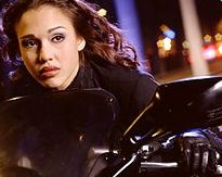 Max on her motorcycle